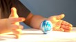 Kid playing Easter eggs close-up