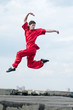Wushoo man in red practice martial art