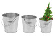 Three metal bucket and a Christmas tree