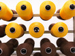 brown and yellow thread reels