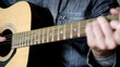 man playing the guitar
