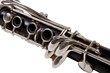 Old clarinet on white background, close up. Old clarinet on white background, close up.