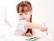 girl painting with watercolor