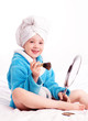 child applying makeup