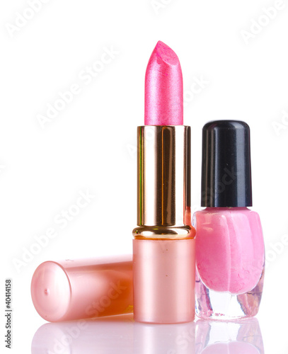 Photo: Pink lipstick and nail polish isolated on white Pink lipstick and nail polish isolated on white