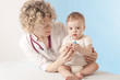 Female doctor and baby patient.