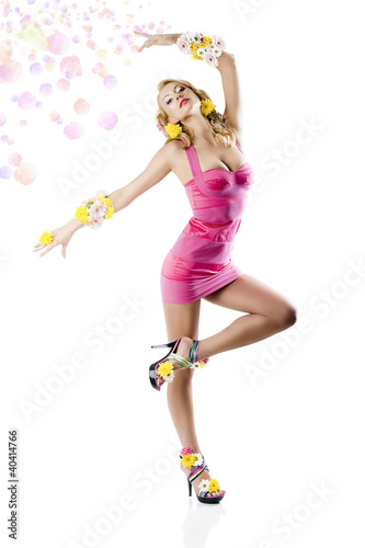 Photo: flower fashion girl with pink dress in a ballet position flower fashion girl with pink dress in a ballet position