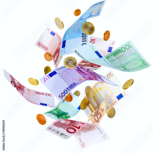 Photo: Falling Euro banknotes and coins isolated on white Falling Euro banknotes and coins isolated on white