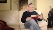 Video: senior man reading a book senior man reading a book