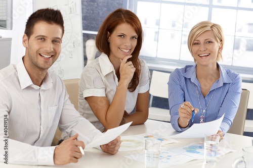 Photo: Happy businessteam at meeting Happy businessteam at meeting