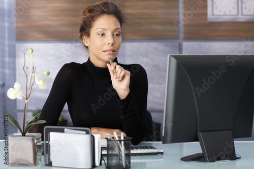 Photo: Portrait of attractive working businesswoman Portrait of attractive working businesswoman
