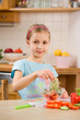 girl making salad
