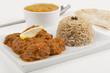 Indian Meat Madras served with pilau rice, tarka dahl & chapatis