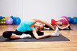 Photo: Two stretching girls Two stretching girls