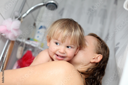 Photo: Baby taking a shower with mama Baby taking a shower with mama