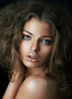 Sexy beautiful young woman face with clean skin. Natural mekeup