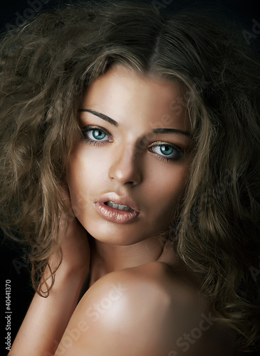 Photo: Sexy beautiful young woman face with clean skin. Natural mekeup Sexy beautiful young woman face with clean skin. Natural mekeup