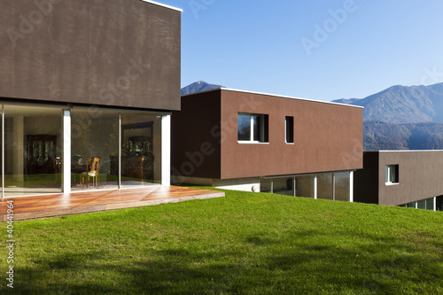 Photo: beautiful modern house with garden, outdoor beautiful modern house with garden, outdoor