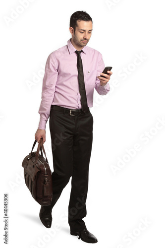 Photo: architetto con borsa e telefono architetto con borsa e telefono