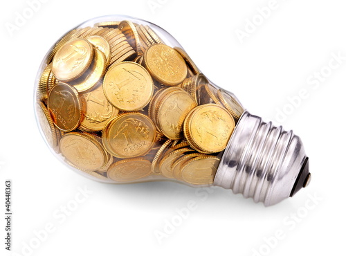 Photo: Traditional glass bulb with many golden coins Traditional glass bulb with many golden coins
