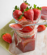 strawberries marmalade on a wooden table