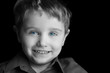 Foto: Happy Young Boy Isolated on Black Happy Young Boy Isolated on Black
