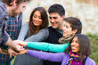 Multiracial Students with Hands on Stack