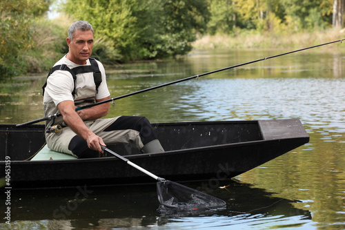 Photo: Man out fishing Man out fishing