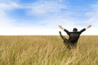 Excited businessman sitting outdoor Excited businessman sitting outdoor