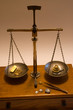 Weighing Gold on Antique Balance Scale