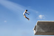 Woman jumping off the bridge