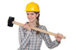 Handywoman holding hammer