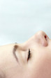 Foto: Close-up side shot of a lady sleeping. Close-up side shot of a lady sleeping.