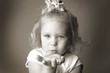 A girl blowing a kiss at the camera.