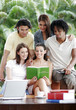 Three ladies, a guy and a african american guy sharing a book.