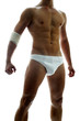 Photo: Shoulder down shot of a shirtless muscular man in white underwear with a bandage on his elbow. Shoulder down shot of a shirtless muscular man in white underwear with a bandage on his elbow.