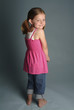 a girl looking shy.