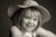 a girl in straw hat.