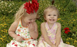Photo: two girls in a garden. two girls in a garden.