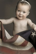 a young girl playing with flag.