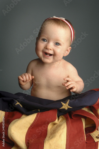 Photo: a baby smiling. a baby smiling.