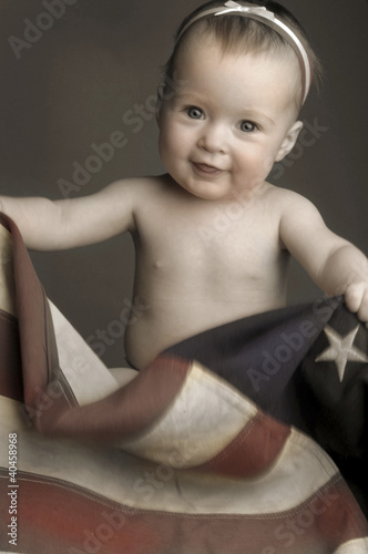 Photo: a young girl playing with flag. a young girl playing with flag.