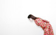 side shot of a woman in red kimono bowing. 