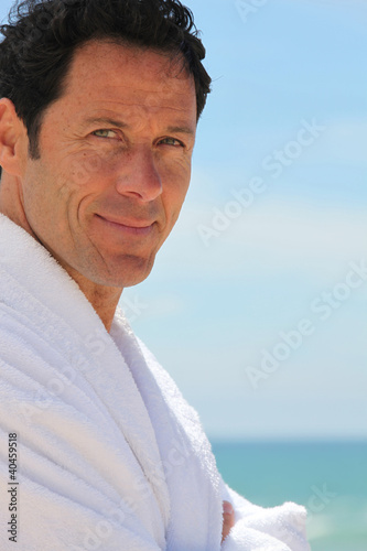 Photo: Man in bathrobe Man in bathrobe