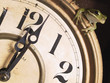 A frog on a clock.