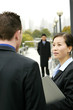 A woman talking to his superior. 