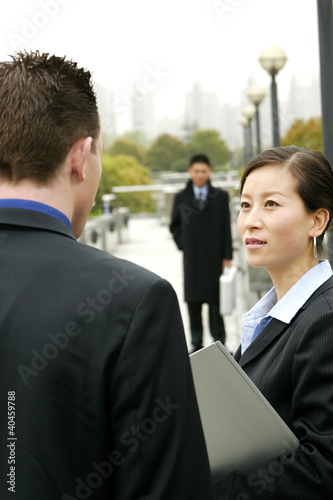 Photo: A woman talking to his superior. A woman talking to his superior.