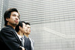 Three men in office attires.