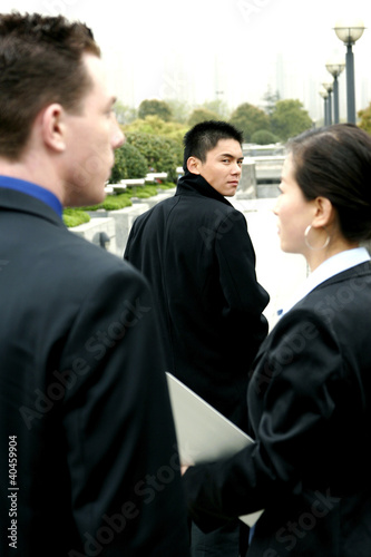 Photo: A group of business people. A group of business people.