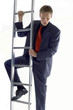 Businessman looking scared climbing up the ladder. 
